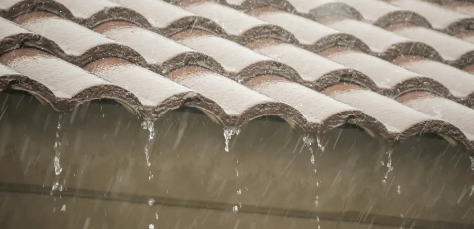 Emergency tile roof leak repair during monsoon rain in Tucson AZ