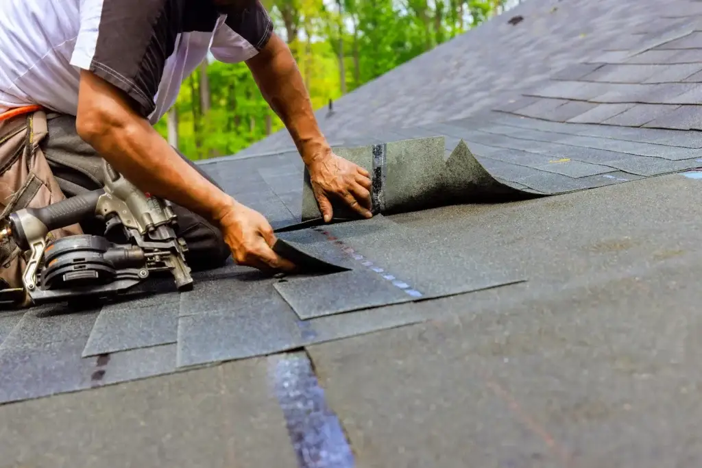 Technician installing roof underlayment in Tucson