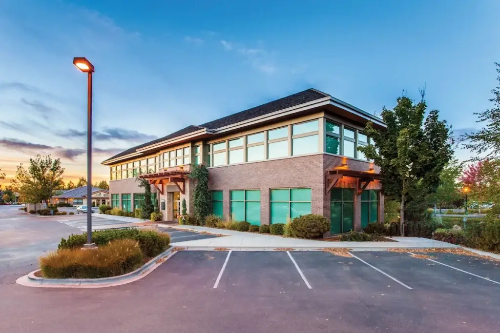 Commercial office building with pitched shingle roof in Tucson Arizona